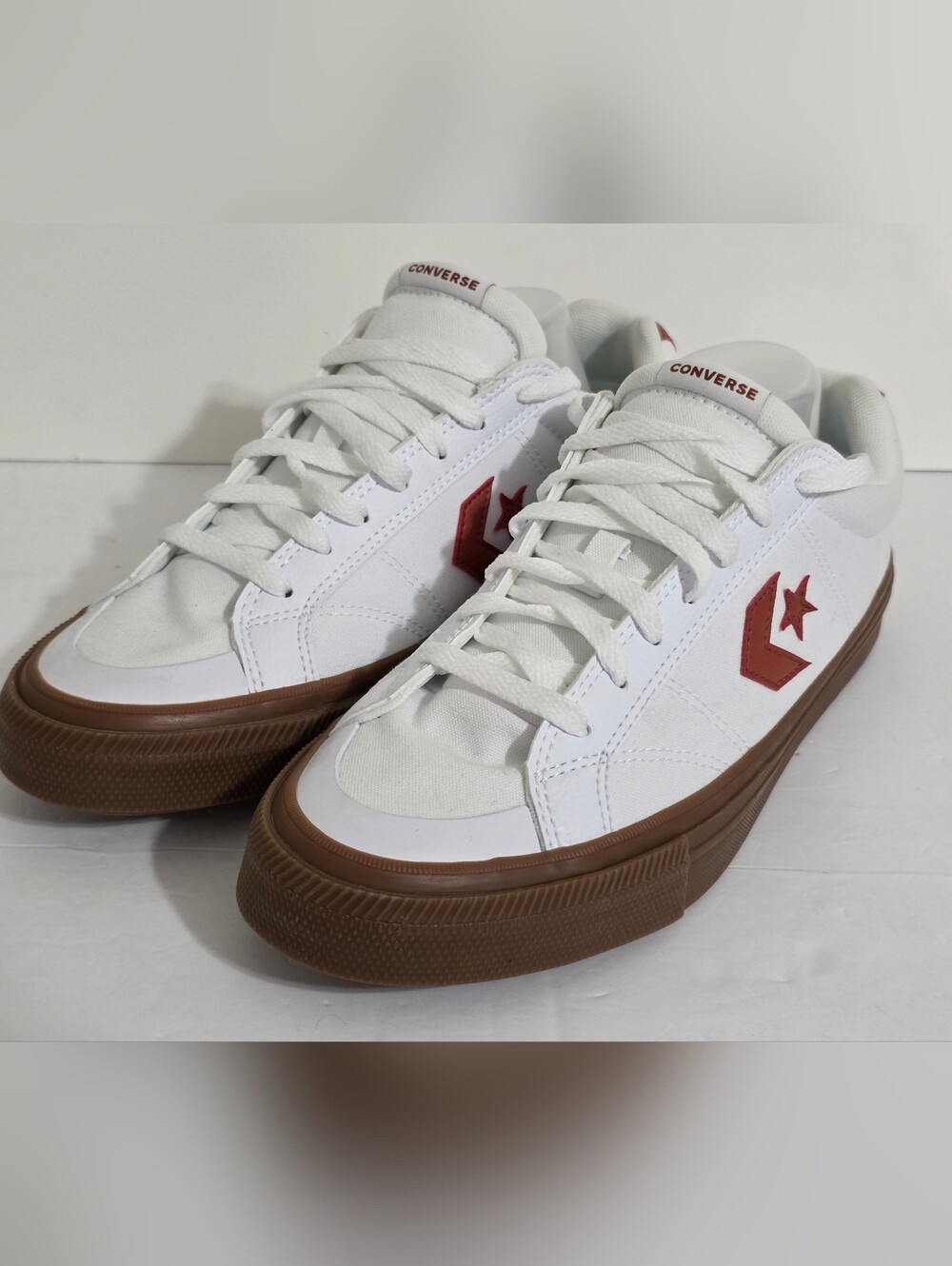 Converse White Low-Top Sneakers with Brown Sole and Red Star Chevron